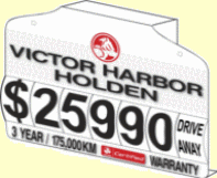 Victor Harbor Holden mirror hanger displaying automotive signage and pricing.
