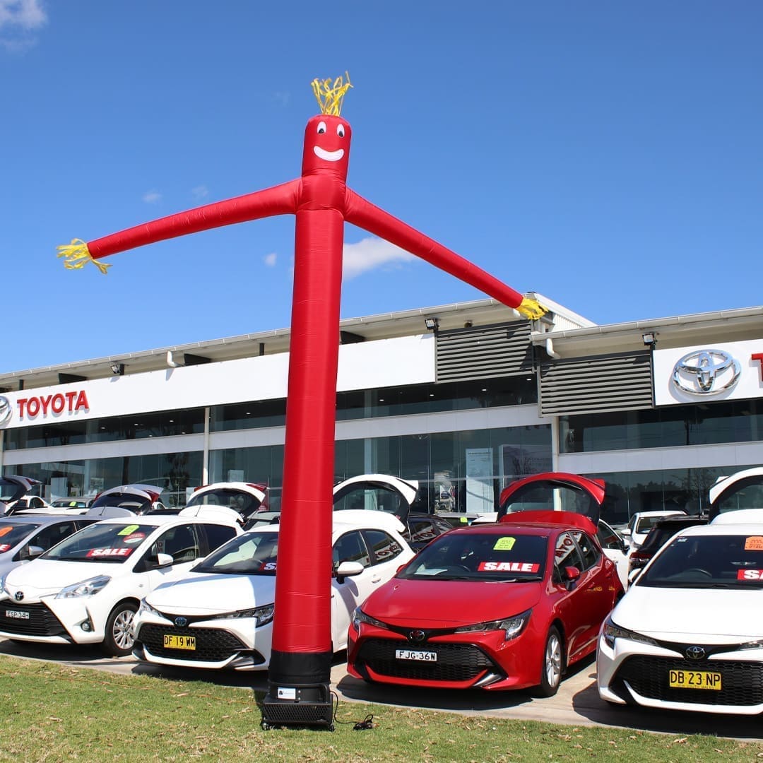 112R1 Red inflatable air dancer promoting Toyota car dealership and sales