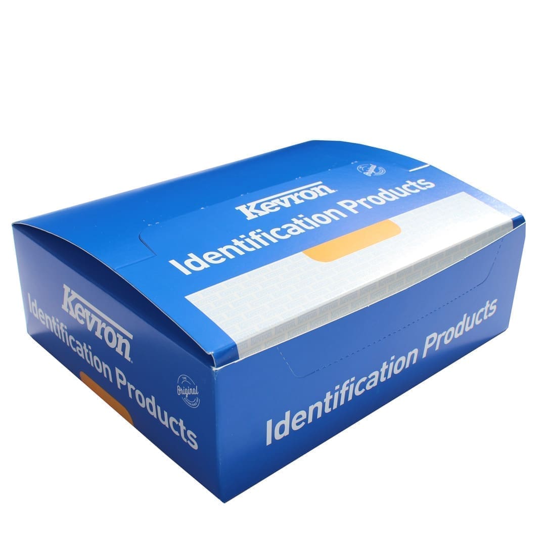 Blue box labeled "Kevron Identification Products," showcasing packaging for automotive key tags and accessories from Trackside Auto Visuals.